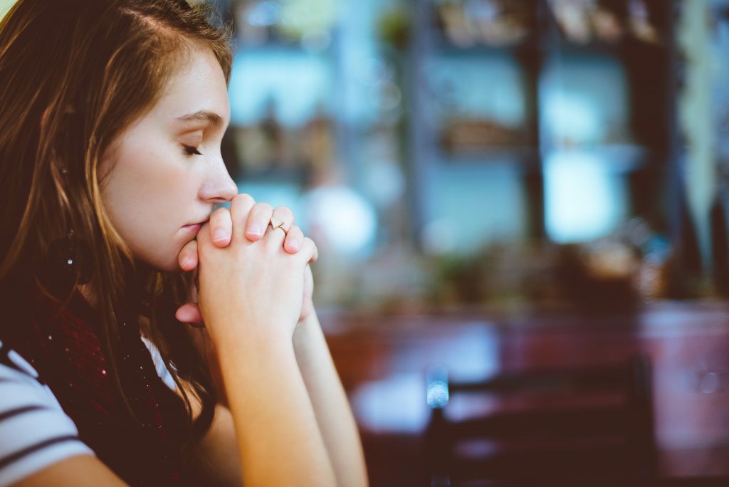 thinking woman with closed eyes