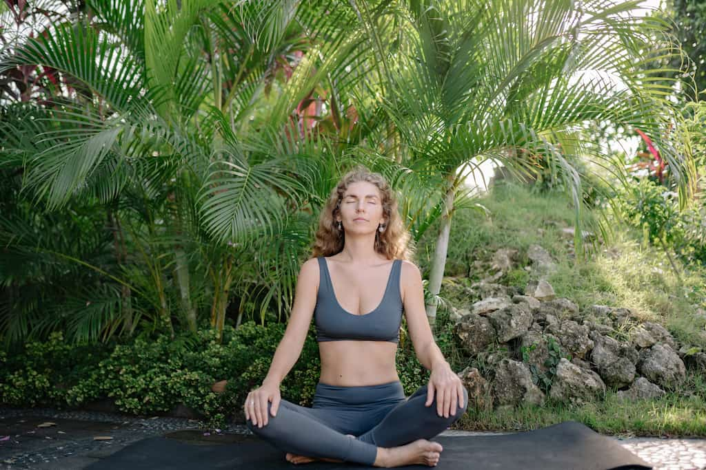 woman meditating in nature