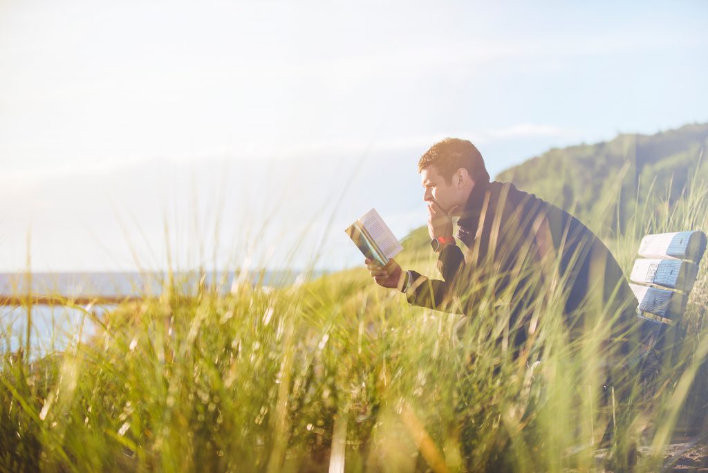 man reading a book