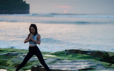 woman standing and meditating