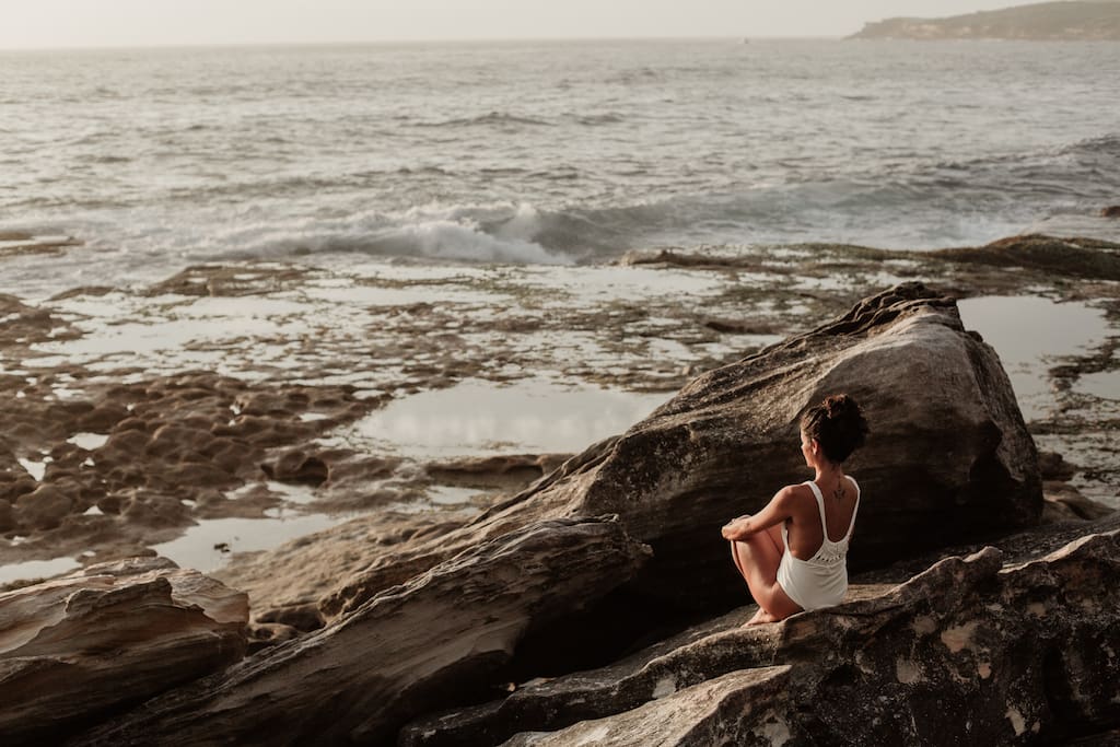 meditating seaside