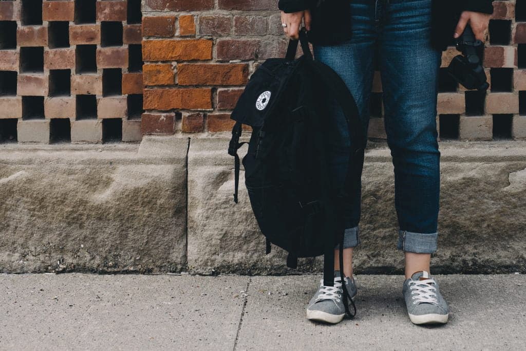 student holding a bag