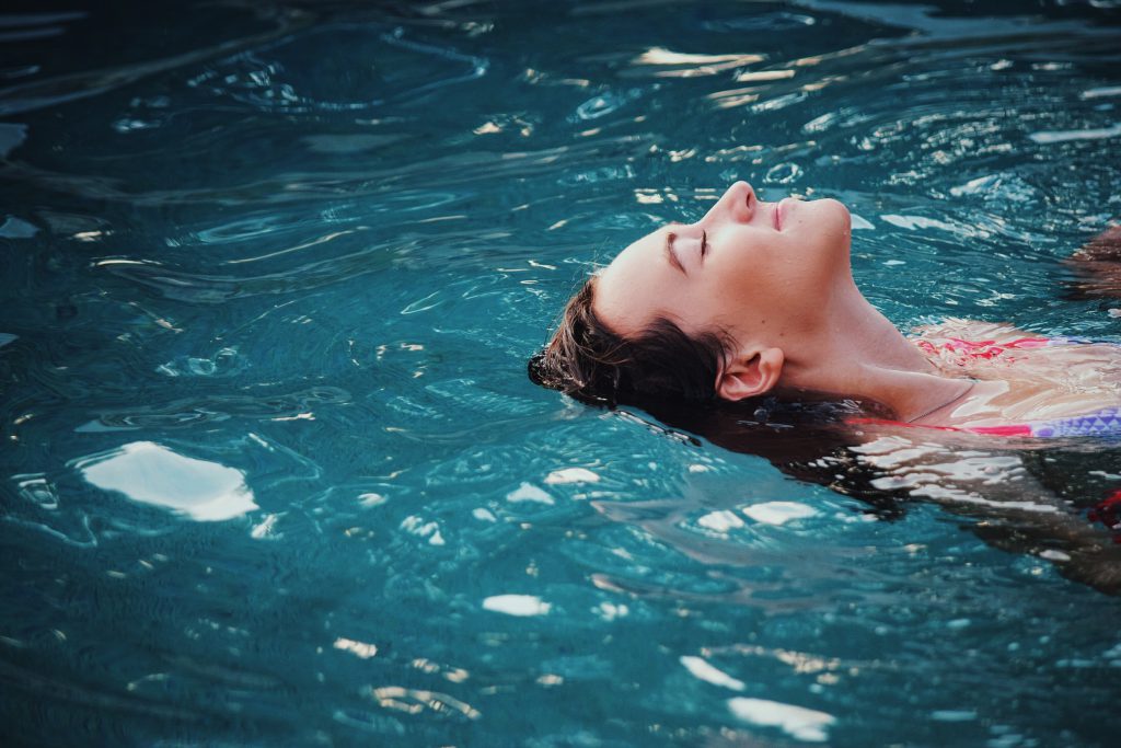 woman swimming calmly