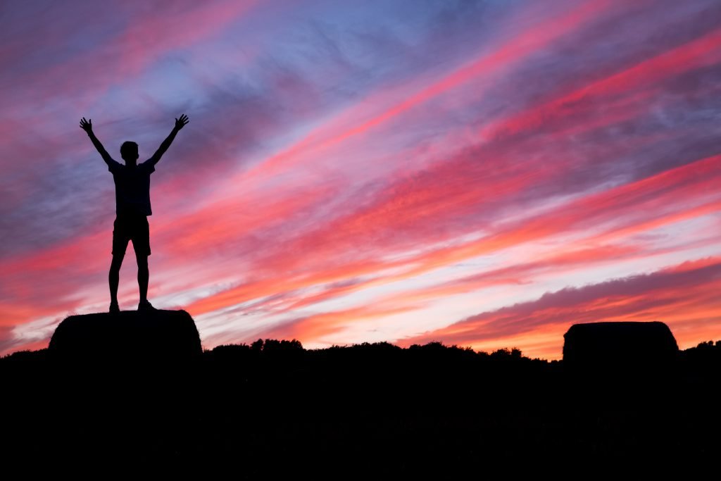 happy person and a fascinating sky 