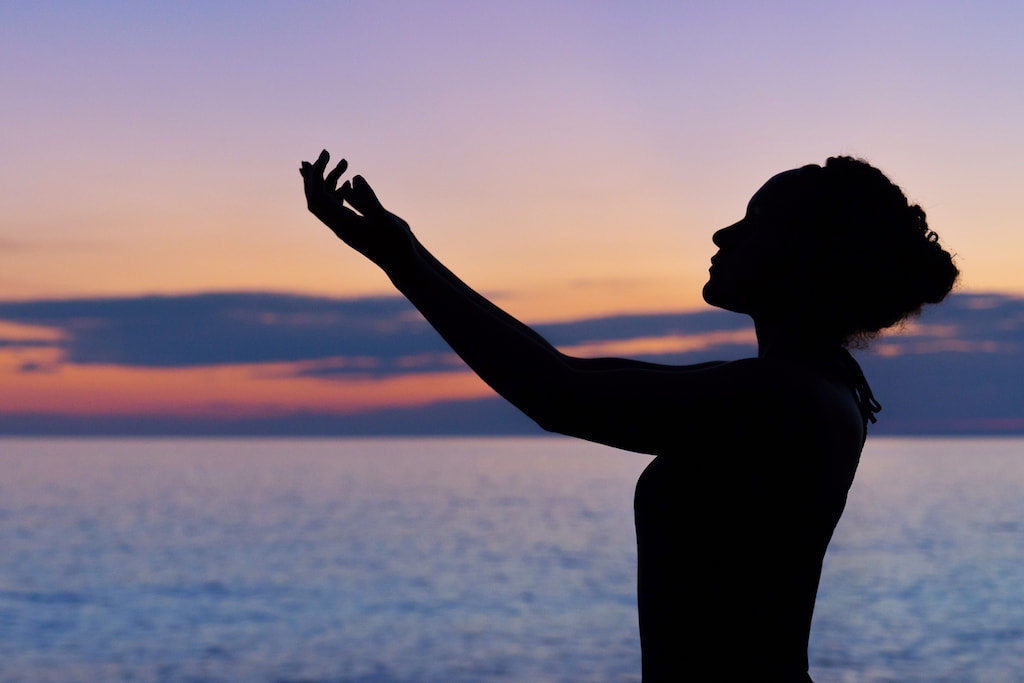 spiritual woman near sea