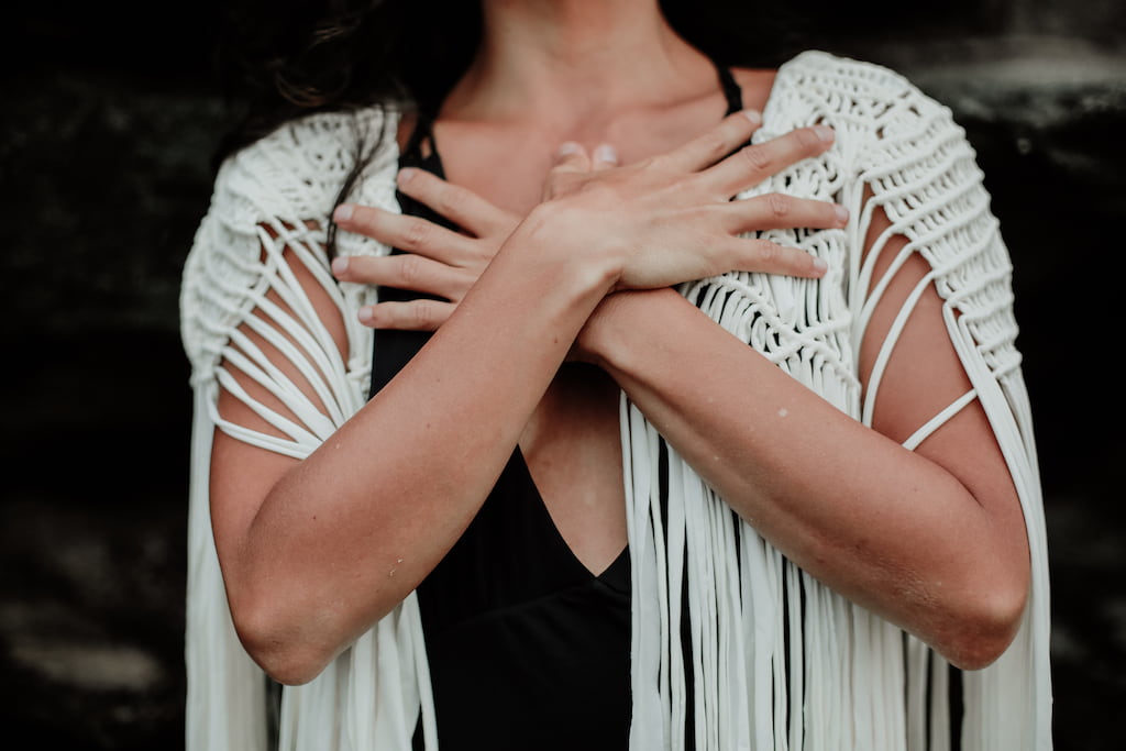 woman hugging herself