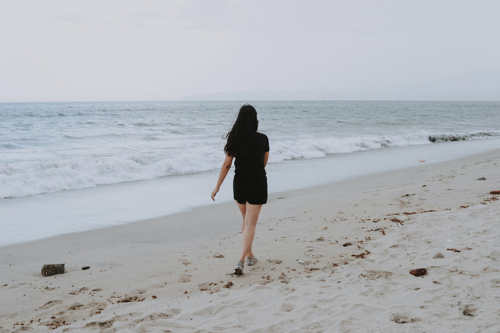 woman walking in the beach