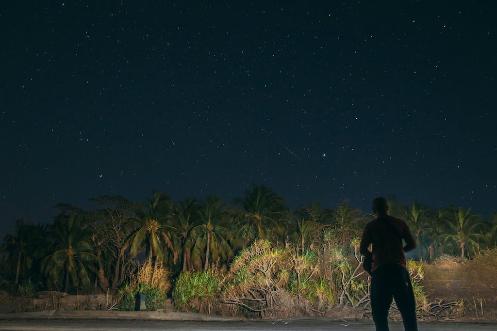 man looking at the sky