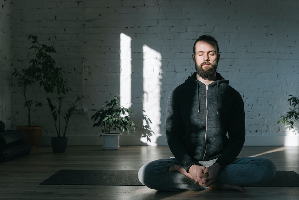 meditating sitting cross legged