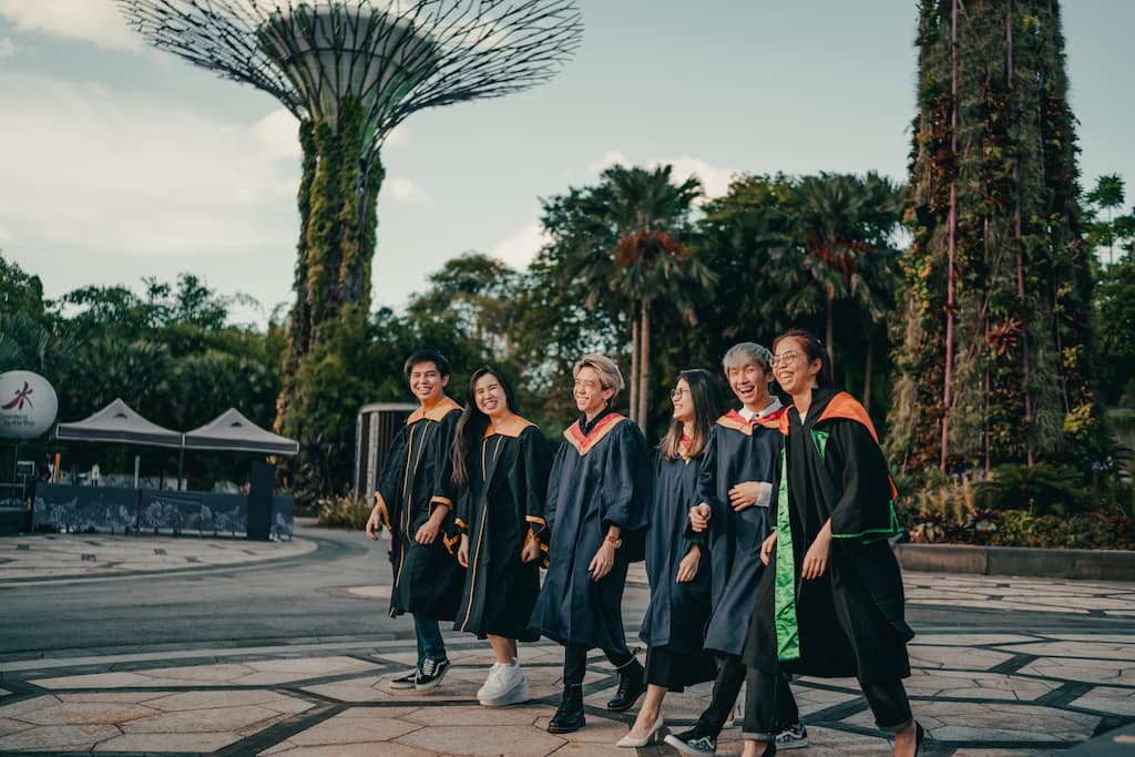 students walking at graduation