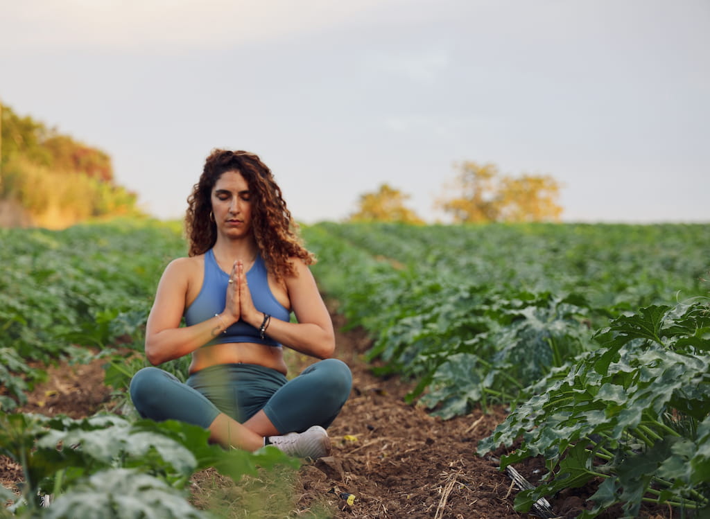 woman meditating in nature