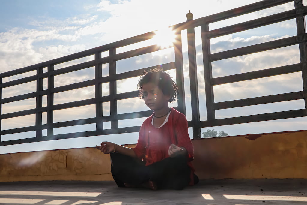 child meditating