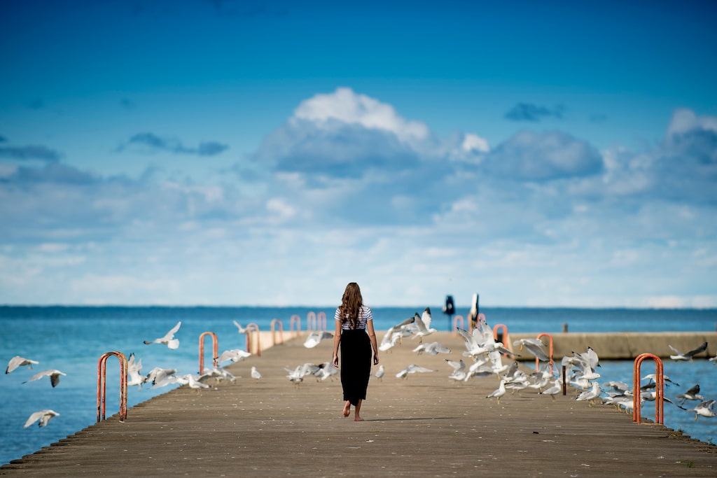 woman walking seaside