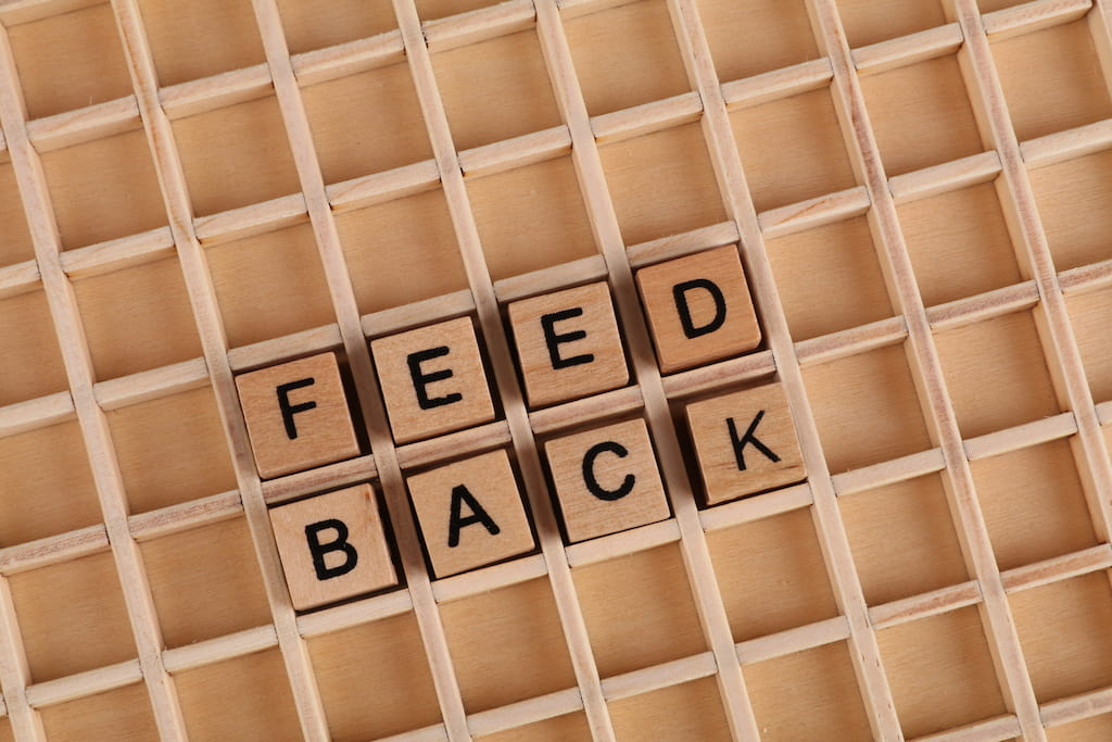 image of scrabble letters spelling feedback